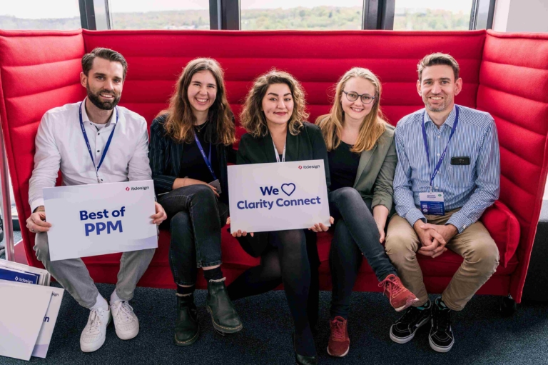 Consultants and customer on the red sofa